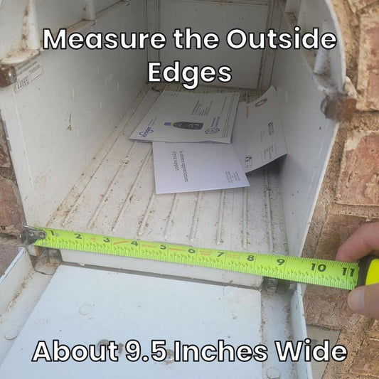 Measuring the outside edges of a Design 3 mailbox, about 9.5 inches wide