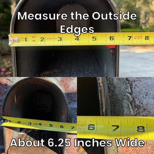 Measuring the outside edges of a small metal mailbox, about 6.25 inches wide