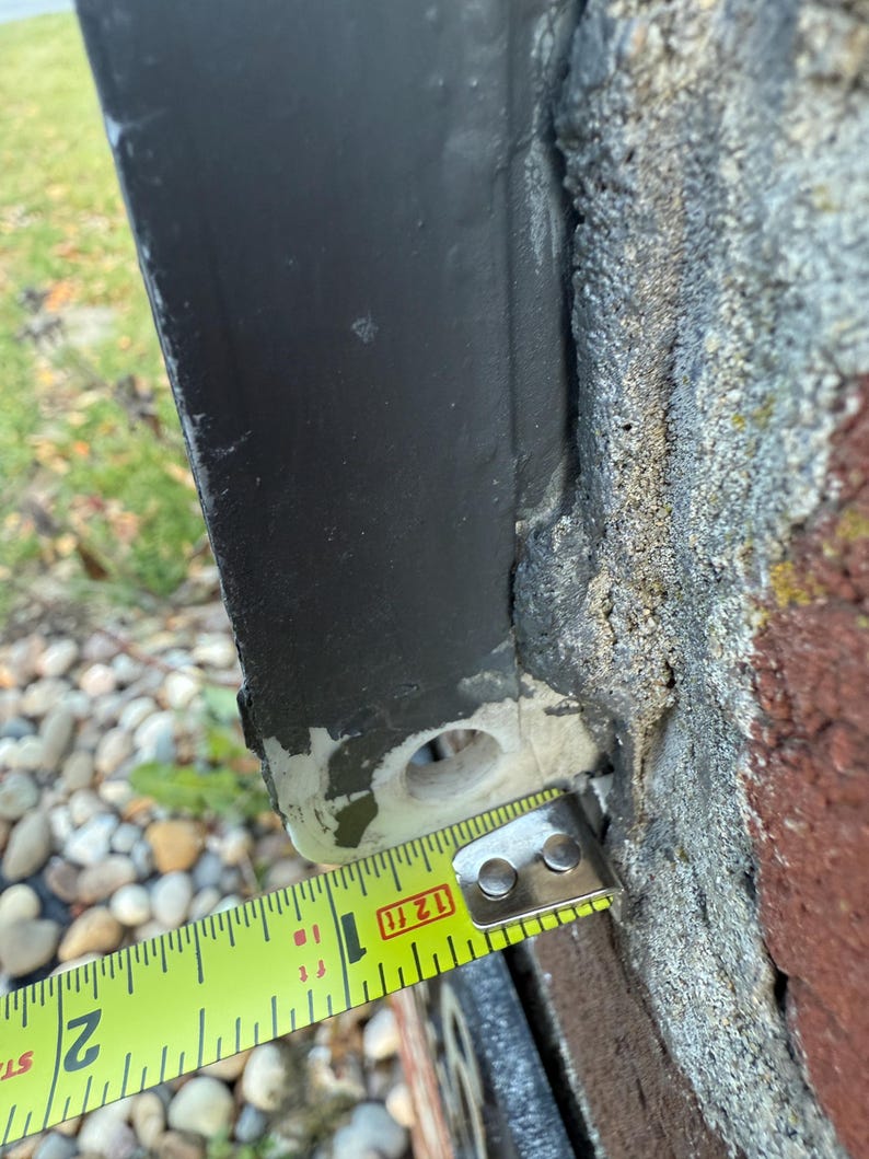 Close-up of mailbox hinge hardware measurement approximately 1 inch