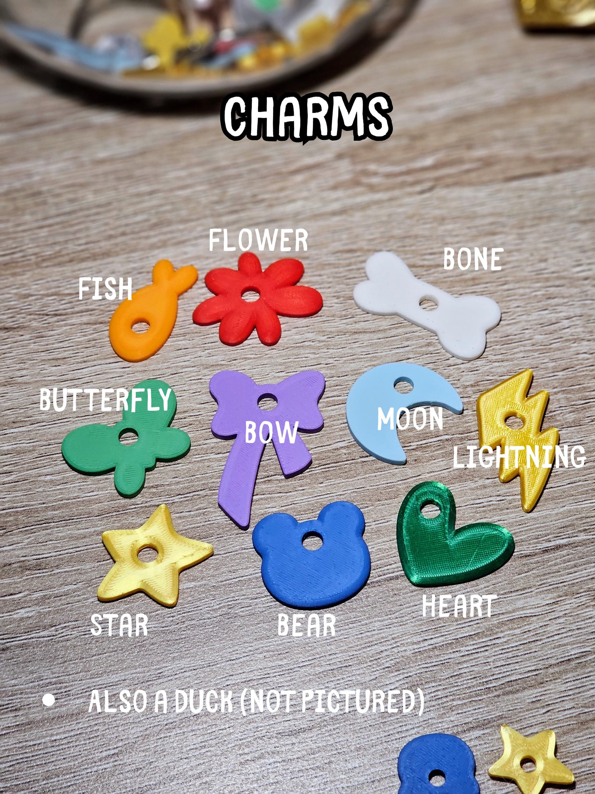 Charm options: fish, flower, bone, butterfly, bow, moon, lightning, star, bear, heart
