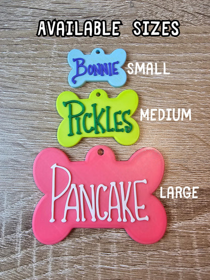 Bone pet tag available sizes: small, medium, large