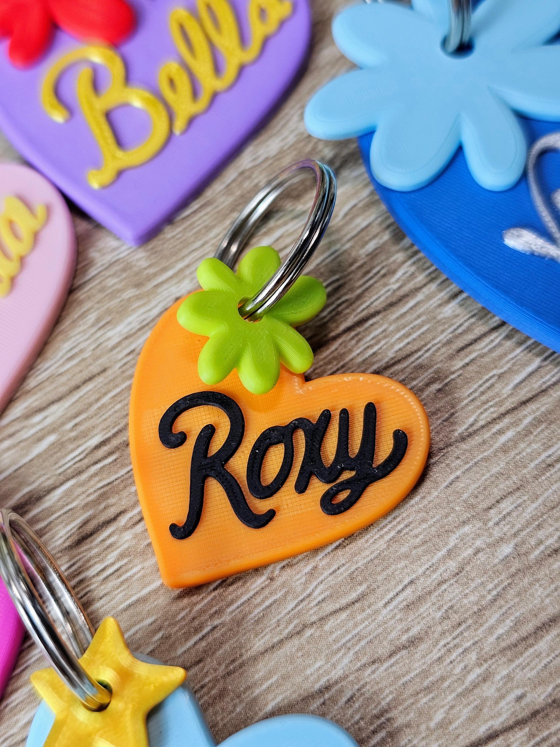 Group of heart tags in several colors and names