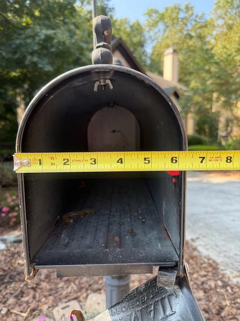Small metal mailbox hinge hole location