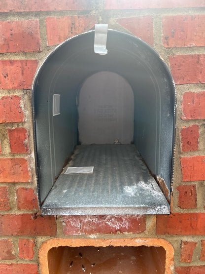 Large metal mailbox opening measured about 11 inches wide