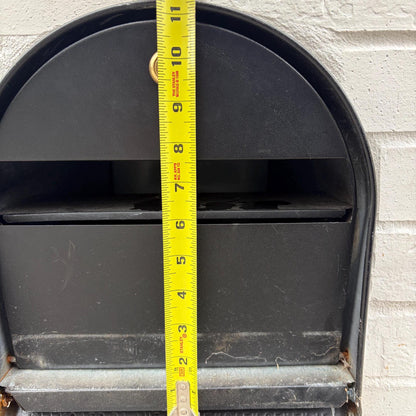 Metal mailbox opening measured about 11 inches wide