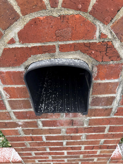 Design 9 mailbox opening in a red brick wall with no door
