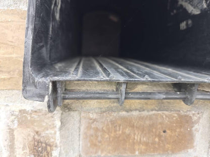 Close-up of the hinge area at the bottom of the Design 9 mailbox