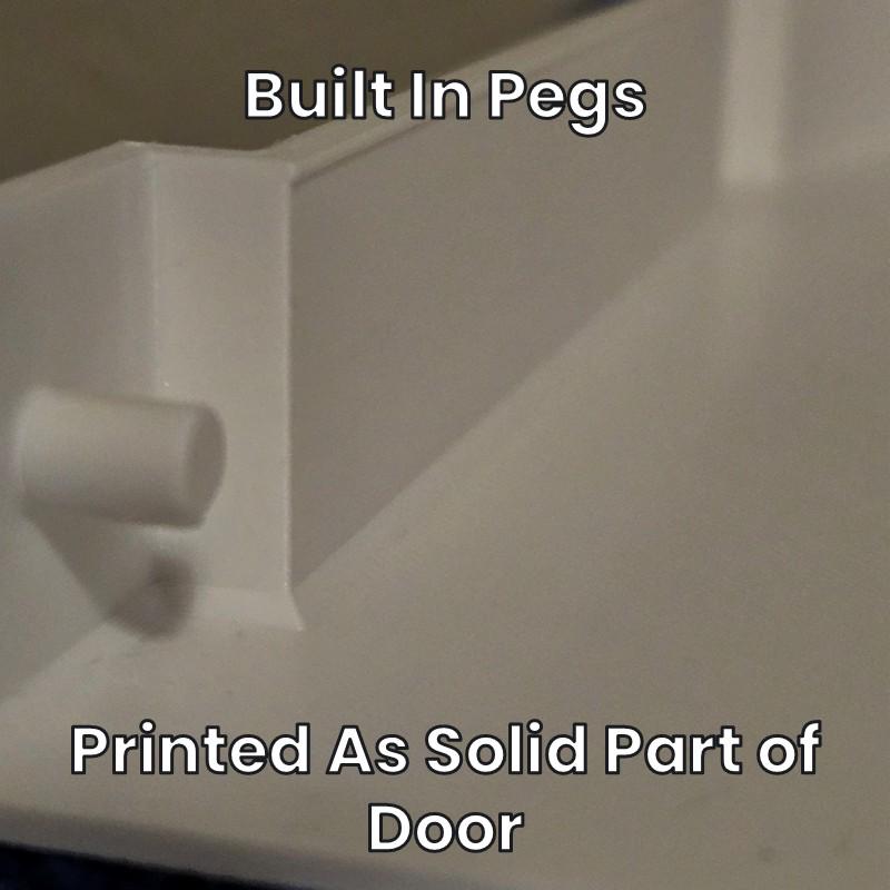 Built-in pegs printed as a solid part of the replacement door