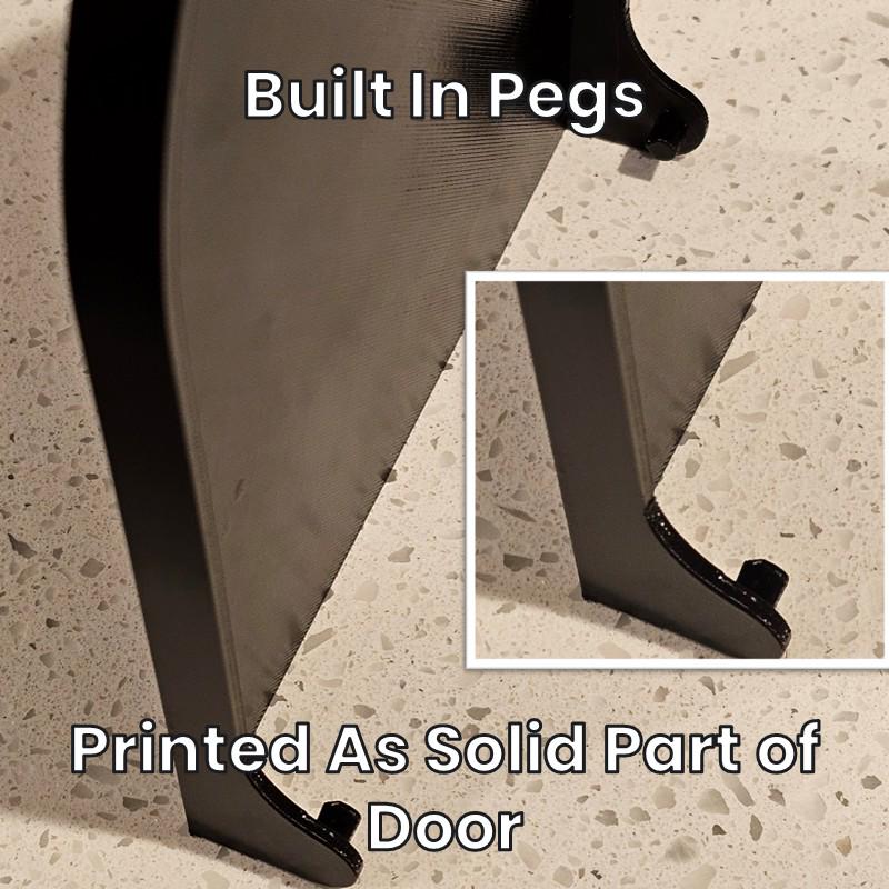 Built-in pegs printed as a solid part of the replacement door