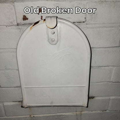 Old broken door on a white medium metal mailbox
