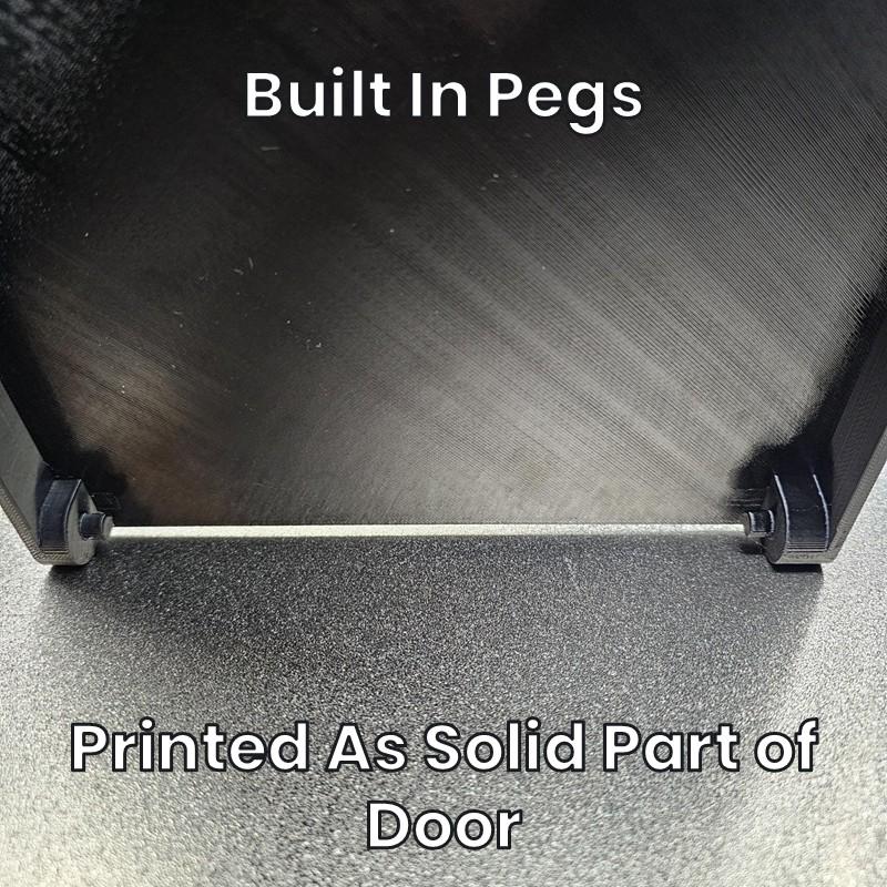 Built-in pegs printed as a solid part of the door