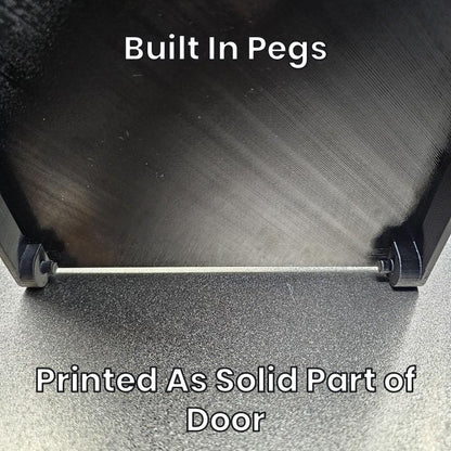 Built-in pegs printed as a solid part of the door