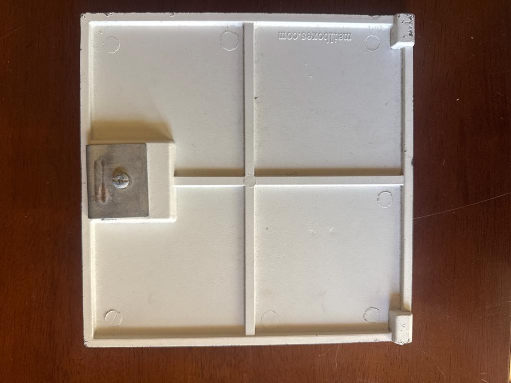 Original square mailbox door, back, with latch