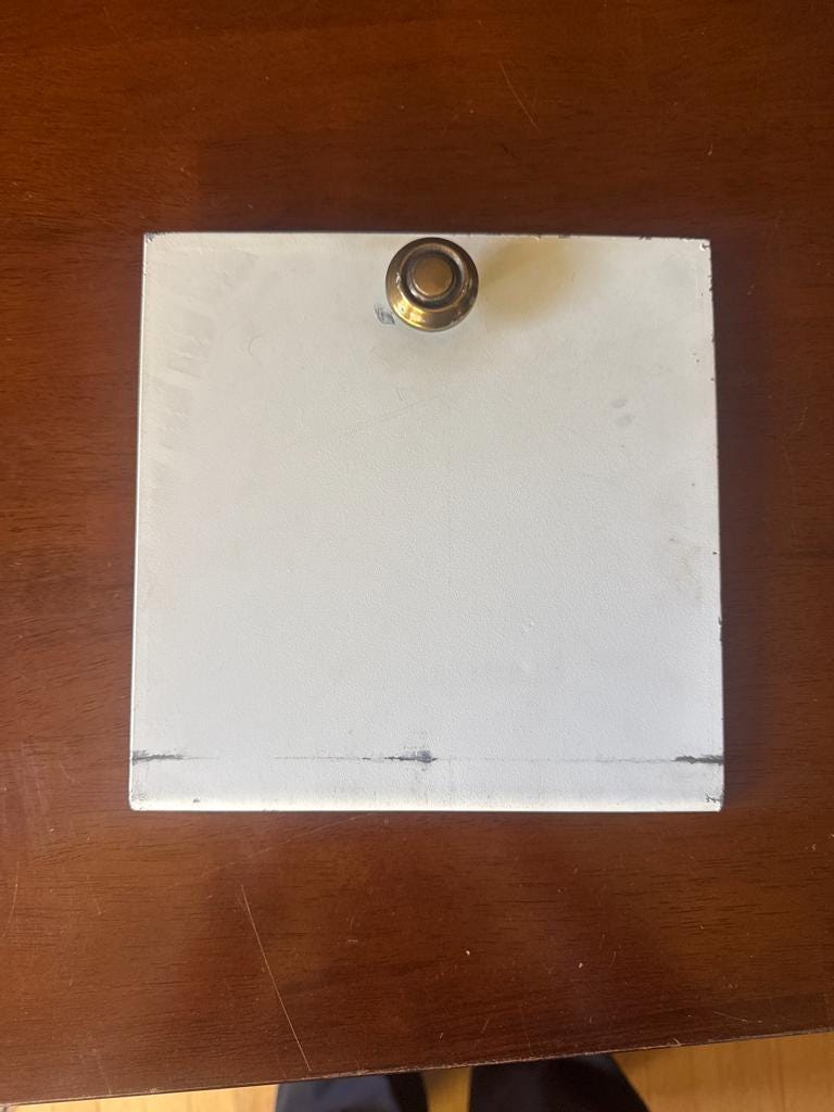 Original square mailbox door, front, with knob