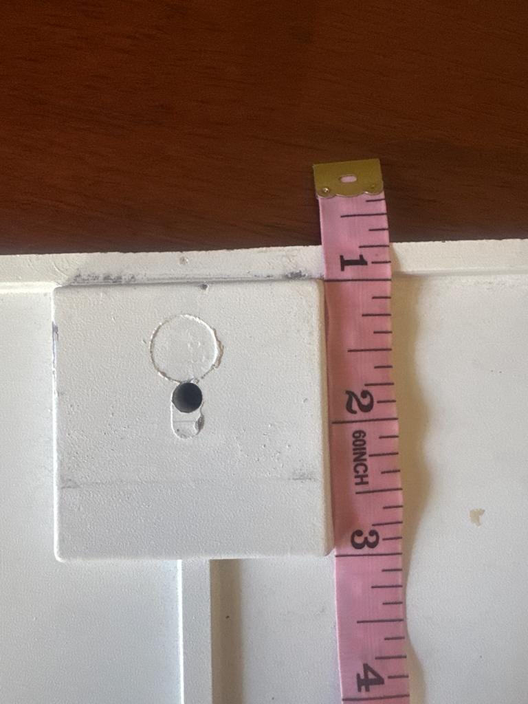 Latch mount on the original door with a tape measure, height