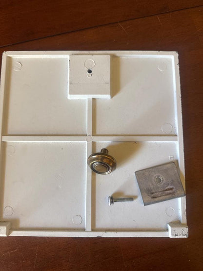 Original square mailbox door with knob, screw and latch plate removed