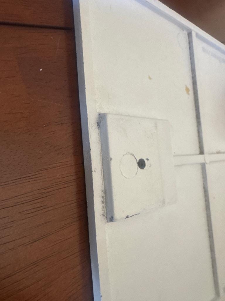 Latch mount detail on the back of the original door