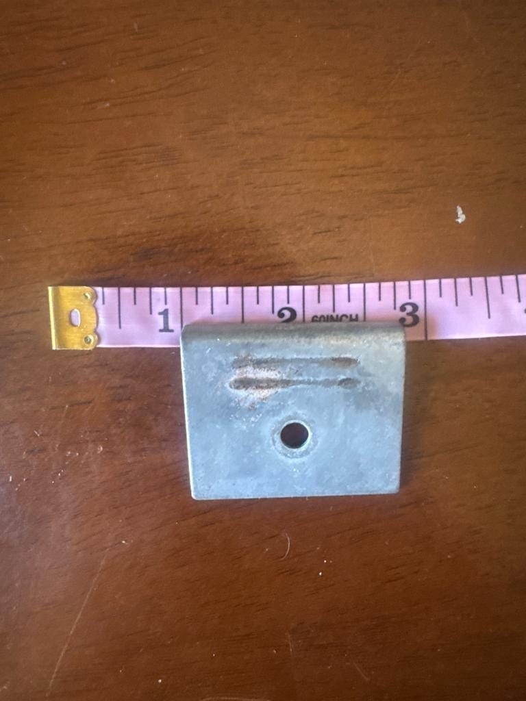Original latch plate with a tape measure, second dimension